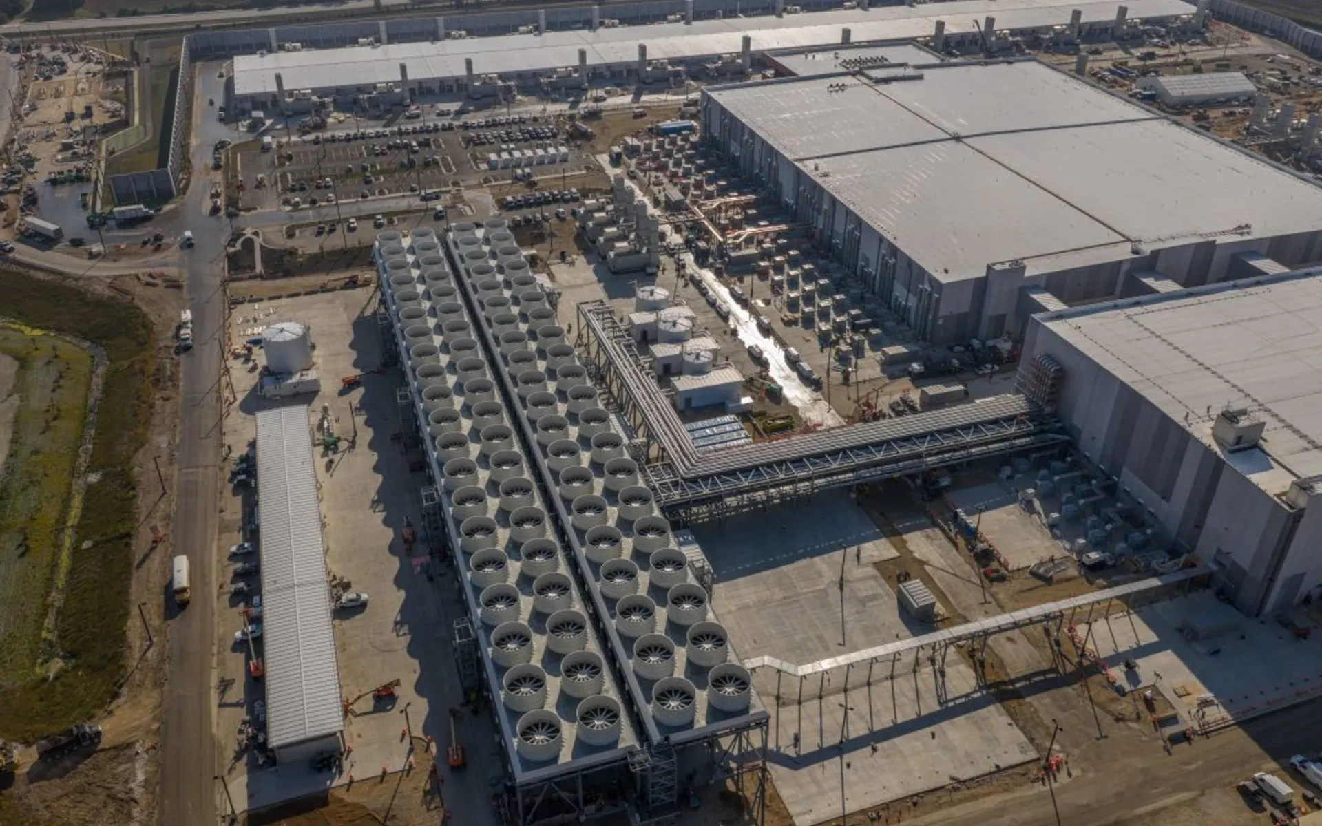 Aerial view of Microsoft's Fairwater AI datacenter in Wisconsin showing massive cooling systems