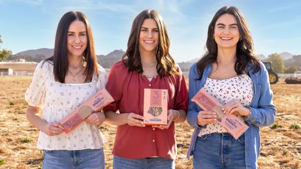 Three Farm Daughters sisters display Made in USA pasta products on North Dakota farm with mountains backdrop