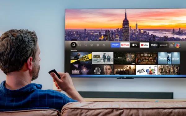 Fire TV interface displaying streaming services with NYC skyline on smart television