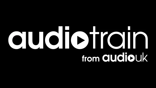 Audiotrain logo from AudioUK featuring white text on black background for podcast training platform