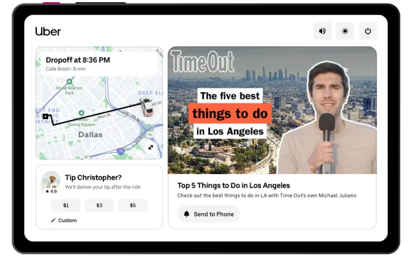 Uber JourneyTV tablet showing Time Out content with trip map and tipping options